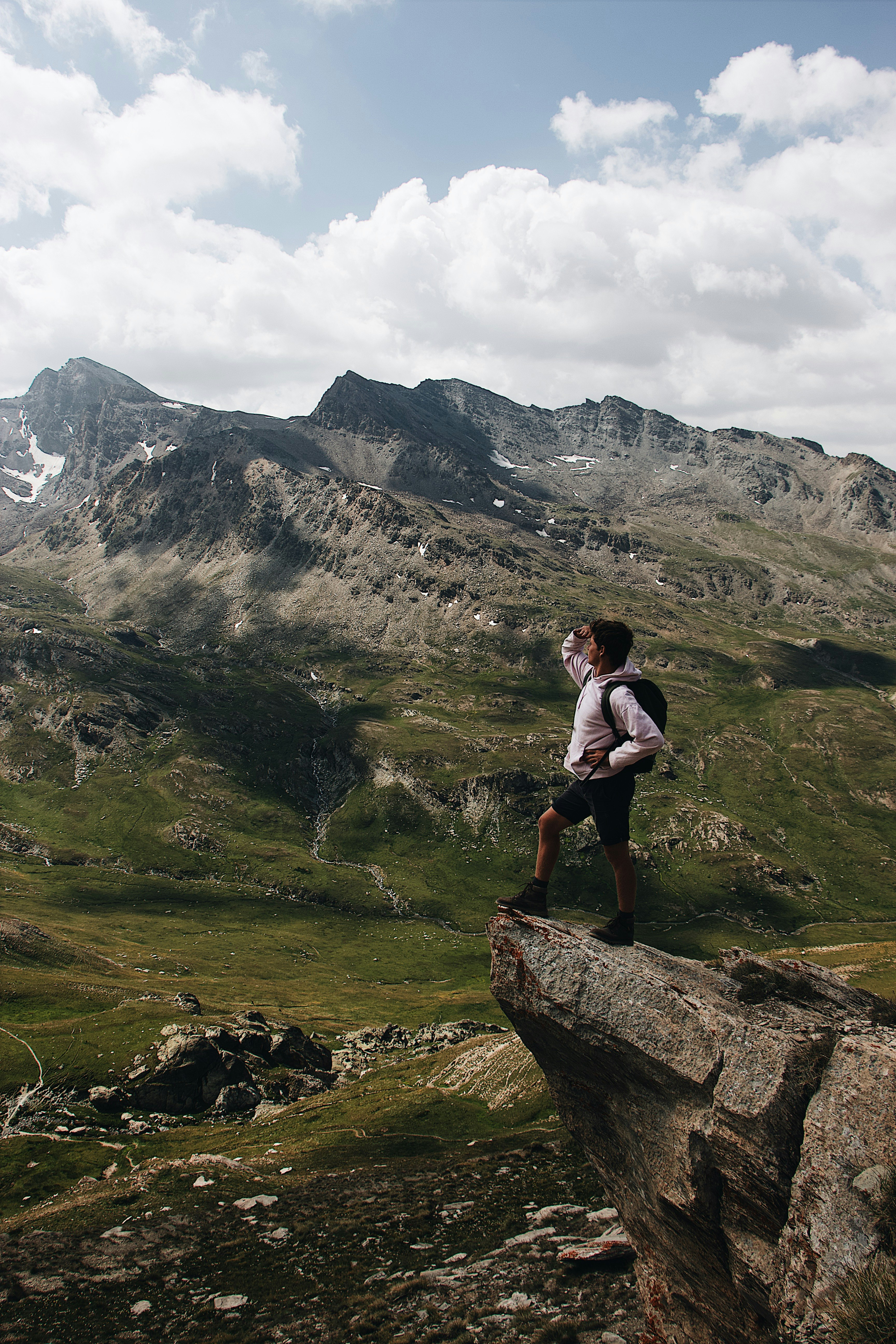 man standing on cliff